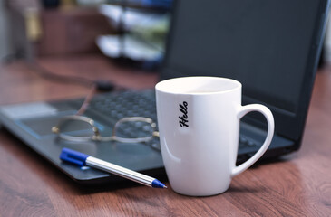 cup of coffee and laptop