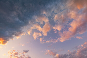 Panorama of orange sunset sky cloudy view with bright sun. Relaxing endless heaven dreamy positive...