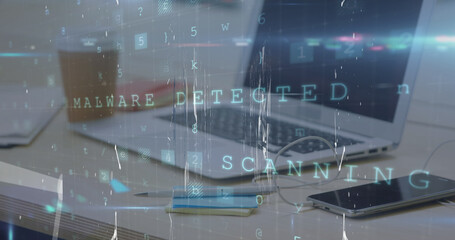 Image of cyber attack warning and data processing over laptop