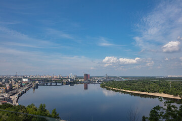 View on Dnipro river from pedestrian and bicycle bridge across Saint Volodymyr descent  in Kyiv,...