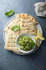 Healthy mashed avocado with pita bread