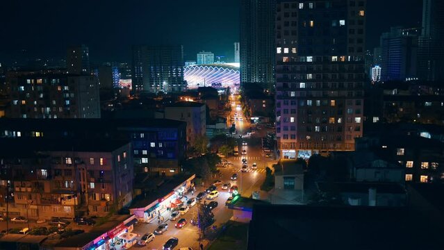 Evening big city. Megacity night cars and skyscrapers