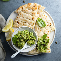 Healthy mashed avocado with pita bread
