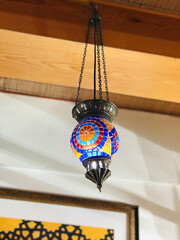 Obraz premium Multicolor Turkish Moroccan style mosaic glass hanging lamp.