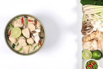 Tom Kha Gai. Thai Chicken Coconut Soup in a Bowl. isolated on a white background. Place with ingredients
