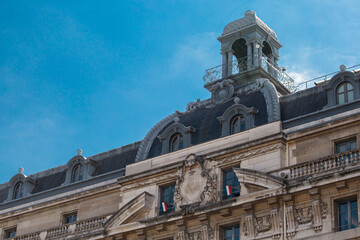 Fototapeta na wymiar Facade of an old Parisian house of medieval architecture - tourist architectural landmarks