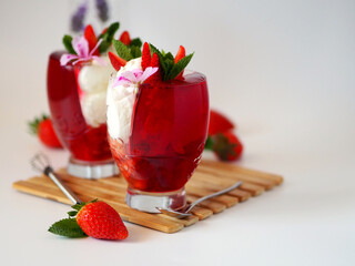 Dessert in a glass. Strawberry jelly and cream