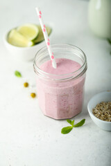 Healthy raspberry smoothie in the jar