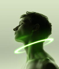 Contemporary design. Young sad man with neon circle around his neck isolated over light green...
