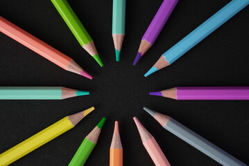 Pastel color lapis on black background leave space to put text message, logo space