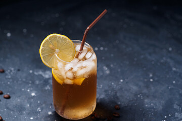 Cold invigorating espresso tonic dark background