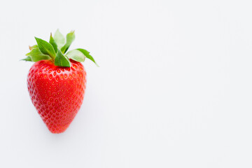 Close up view of red strawberry on white background with copy space.