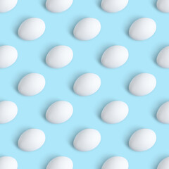 Group of chicken eggs on light blue background, flat lay. Seamless pattern design