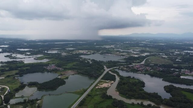 Aerial view raining day at abandoned tin mining lake at Kampar, Perak