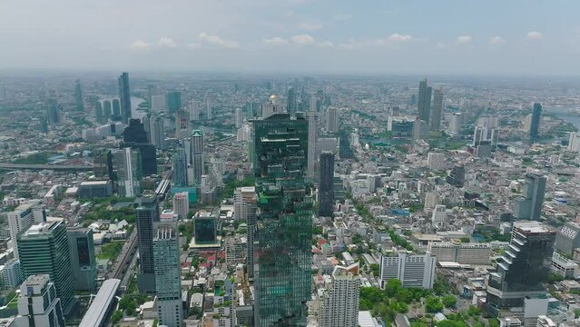 Aerial view of King Power Mahanakhon tower in Sathorn Silom central business district of Bangkok, Thailand