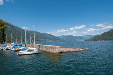 Fototapeta na wymiar Landscape and port Lido di Cannobio on Lake Maggiore in northern Italy
