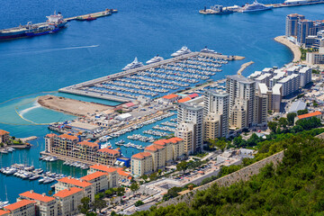 Mid-Harbour marina on the western side of the Gibraltar peninsula, sided by luxury apartment buildings