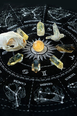quartz minerals, crystal ball, animal skull on black divination zodiac astrology napkin. esoteric practices with natural gemstones. spiritual Magic Crystal Ritual, Witchcraft. 