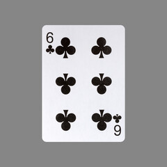 Six of Clubs. Isolated on a gray background. Gamble. Playing cards.