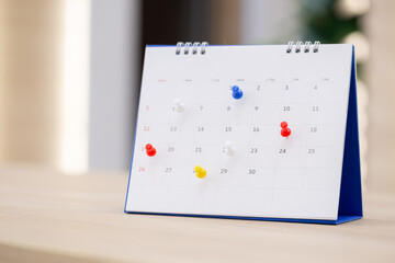 Calendar in office,Business management event,business plan targeted marketing activities, media relations advertising Calender Page With Tacks/Business Concept.