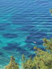 Fototapeta na wymiar parga tourist resort in west greece, valtos beach green waters in summer holidays