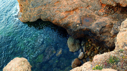 Beautiful sea landscape, sea, rocks and stones, caves and grottoes, evening lighting, sunset, Las Rotas, Denia, Mediterranean, Spain
