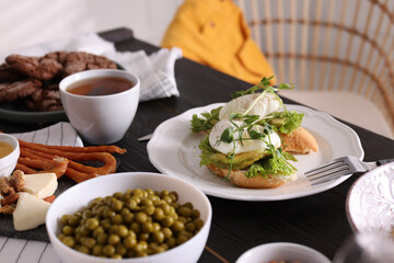 Many different dishes served on buffet table for brunch