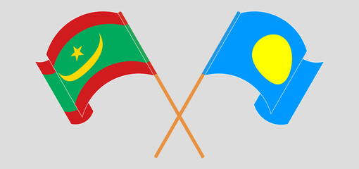 Crossed and waving flags of Mauritania and Palau