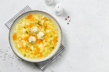 Low calorie turkey meatball soup. Top view, copy space.
