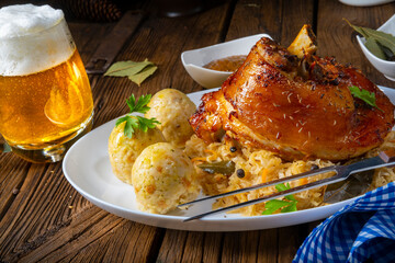 pork knuckle with sauerkraut and sweet mustard