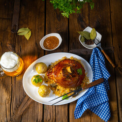 pork knuckle with sauerkraut and sweet mustard