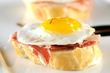 Bread, Chorizo and Fried Quail Egg