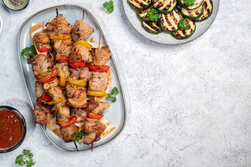 Grilled pork kebab with red and yellow pepper