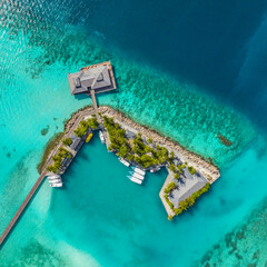 Tropical beach. Maldives. Travel and tourism to luxury resorts in the Maldives islands. Summer holiday concept