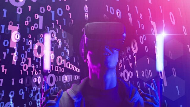 Teenager male playing VR virtual reality metaverse MR mixed reality game wearing VR goggle watching virtual cyberspace futuristic abstract digit number digital technology backgrounds