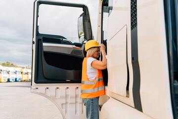 Middle age truck driver woman, trucker occupation in Europe for females