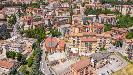 Fototapeta na wymiar Panoramic aerial view of Potenza city, regional capital of Basilicata, Italy. The city is built on the mountain.