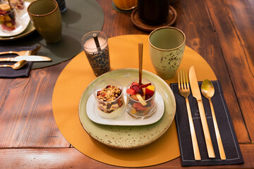 Mediterranean breakfast outdoors in the courtyard of a house with fruit salad