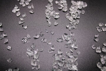 Crushed glass on a black shaded background