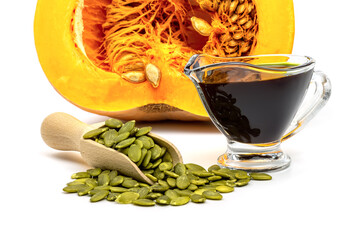 Close-up pumpkin seed and pumpkin seed oil isolated on white background.