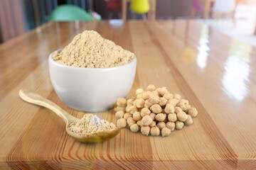 Soybeans and powder in ceramic bowl and dry soy bean.