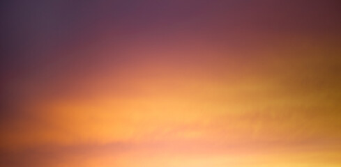 Bright orange sky at sunset, low key. Warm tones.