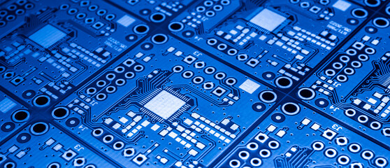  a printed circuit board in blue - obrazy, fototapety, plakaty