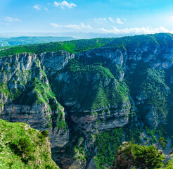 mountain landscape in the Caucasus with rocky cliffs on the slopes of the huge canyon of the Sulak River