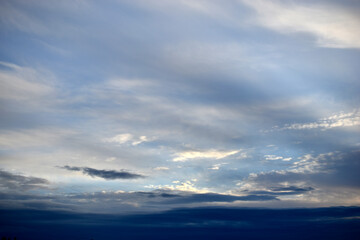 Sunset horizon in the evening bright yellow red clouds