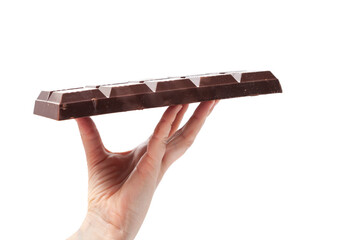 large bar of chocolate in female hand on white background....