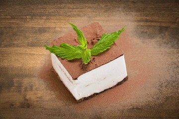 Slice of  sweet Pie with Cream on a white plate