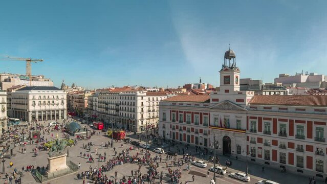 Madrid Spain time lapse 4K, high angle view city skyline timelapse at Puerta del Sol
