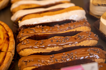 French sweet dessert filled with cream fresh baked eclers cakes