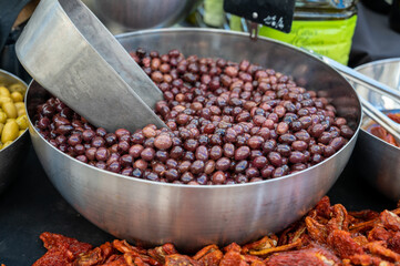 Brown Greek calamata olives for sale on farmers market